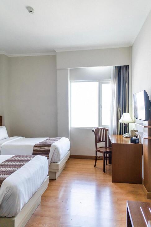 Une chambre de l'hôtel chez Amina